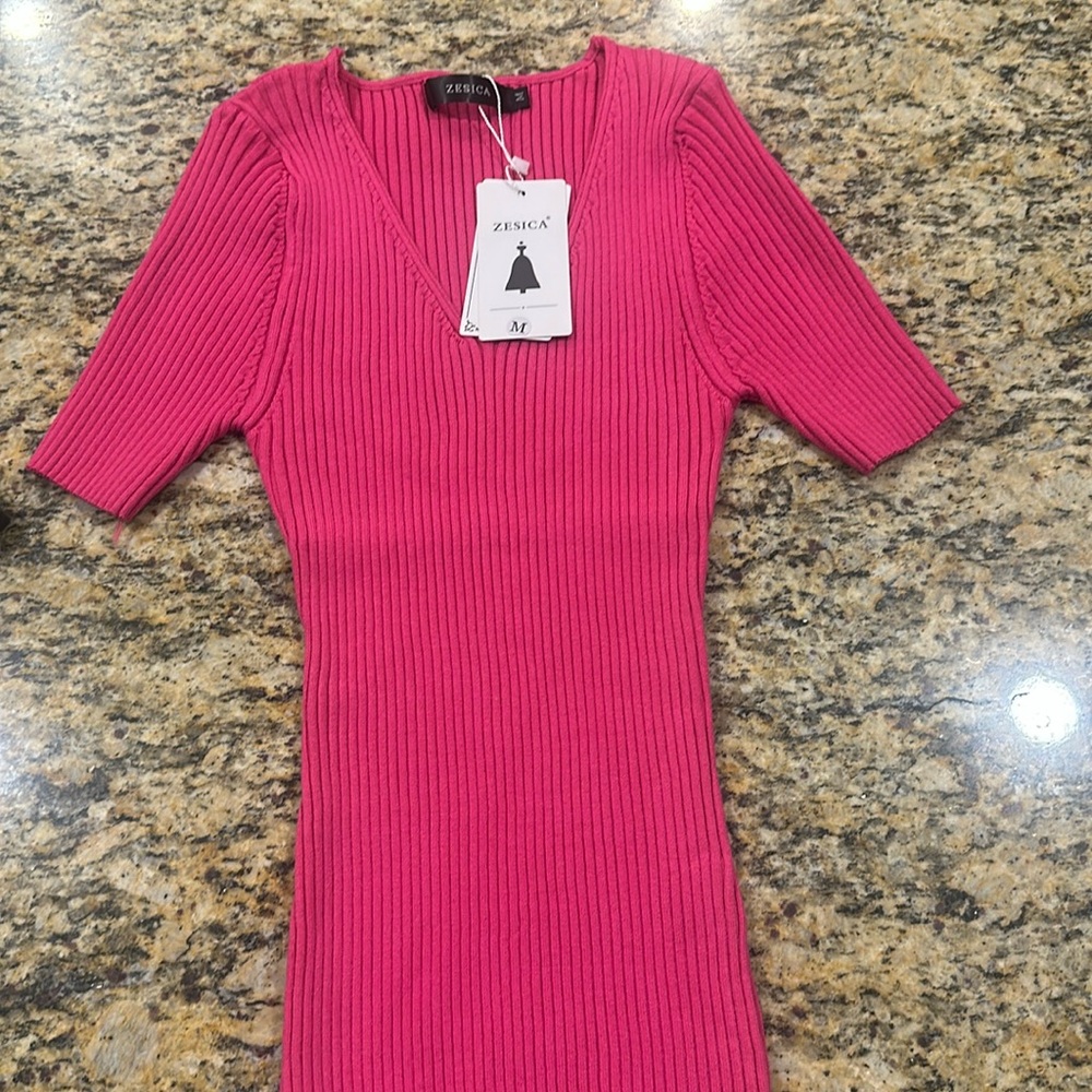 Pink shirt, new with tags never worn tag